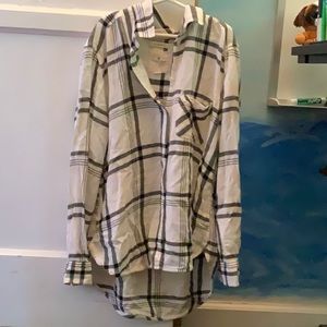 A grey,black,and white flannel